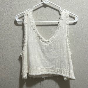 Off white tank top with frayed look on the edges